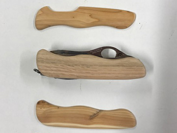 Sackmesserschalen und Sackmesser aus hellem Holz